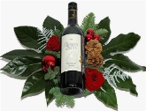 Fles wijn in kerstsfeer rood  burobloemen